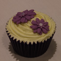 Purple daisy cupcake