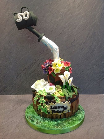 Watering can gravity defying birthday cake