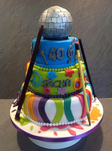 70's disco themed 4 tier cake (round glitter ball on top is made of cake), also with an artist theme