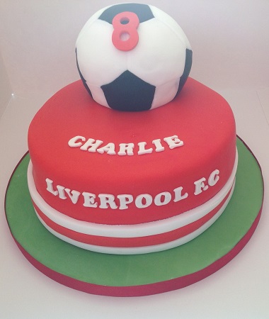 Liverpool FC cake with a spherical football shaped cake on top
