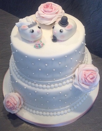Guinea Pig themed white wedding cake
